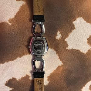 Montana Silversmith Watch. Genuine leather black band, silver horseshoes.